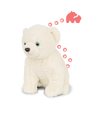 A white polar bear plush toy with blue eyes standing in front of a plain background. Behind the bear are five pink paw print icons leading up to a pink silhouette of a polar bear.
