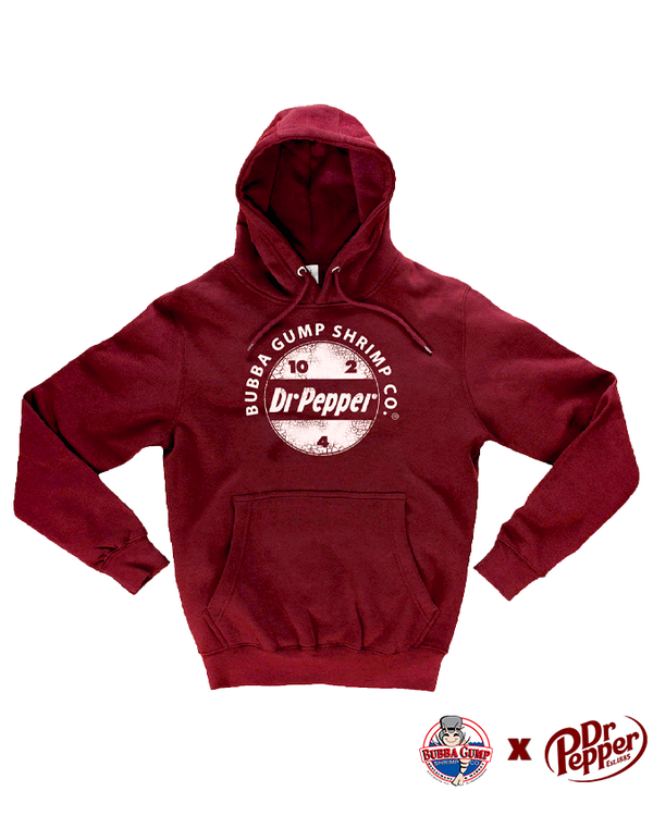 A maroon hoodie with a circular Dr. Pepper graphic, and the numbers "10, 2 & 4" inside. The circle is surrounded by the words "BUBBA GUMP SHRIMP CO.". The sweatshirt is placed against a white background, with a circular Bubba Gump Shrimp Logo X Dr Pepper logo in the bottom corner.