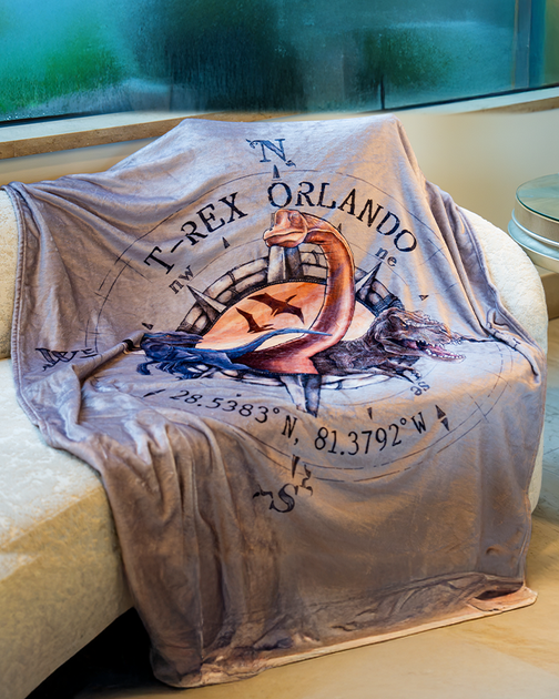 T-Rex Cafe | Explorer | Plush Blanket – Landry's Inc.