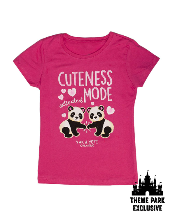 A crewneck tee with two cartoon pandas fist bumping, with white hearts around them and text that reads "Cuteness Mode Activated" at the top and "YAK & YETI ORLANDO" at the bottom. The background is white with a Disney castle silhouette and "Theme Park Exclusive" printed at the bottom corner.