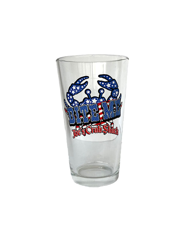 Pint glass with American flag design crab and "Bite Me" in bold blue polka dot font with "Joe's Crab Shack" written in red underneath.