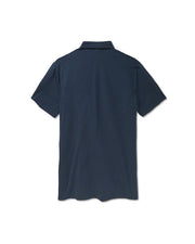 Back of navy blue polo in front of all white background.