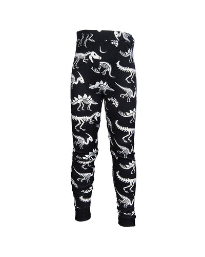 Black pants with dinosaur skeleton pattern in front of white background.