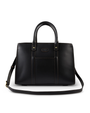 Front View. A sleek black leather handbag with a structured design, featuring two handles and a detachable shoulder strap, elegantly displayed against a white background. Leather patch on top center of bag with a running w.