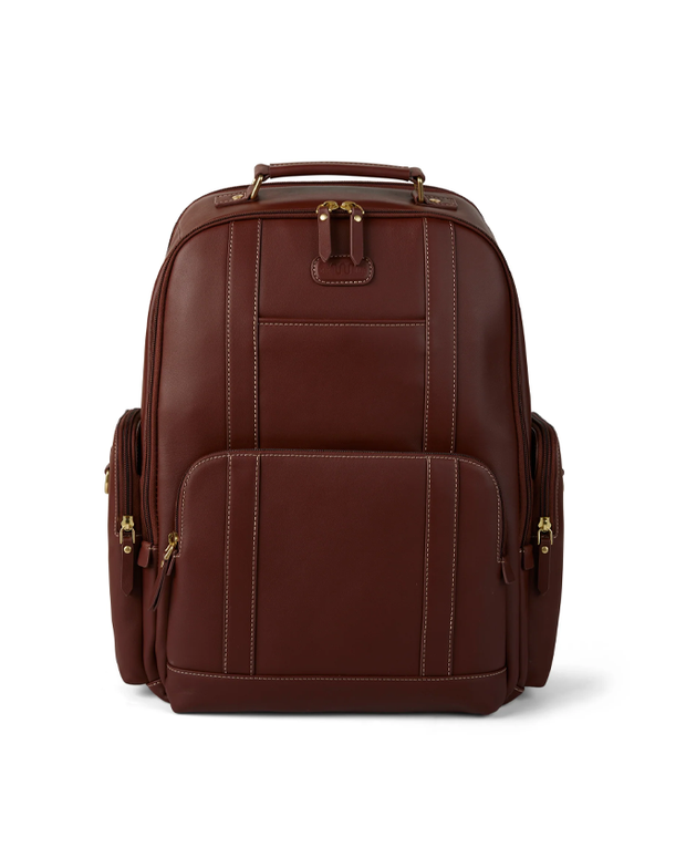 A stylish brown leather backpack with multiple compartments, detailed stitching, and gold zippers, set against a white background, combining functionality with elegance.