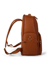 side view of A stylish light brown leather backpack with multiple zippers and a front clasp, standing upright against a white background. The backpack features adjustable straps, quality stitching details, and a small handle for hand carrying, blending functionality with a sleek design.