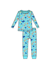 A colorful children’s pajama set with a blue background and a pattern of various sea animals-themed elements like octopus, sea horse, fish, whale and coral. 