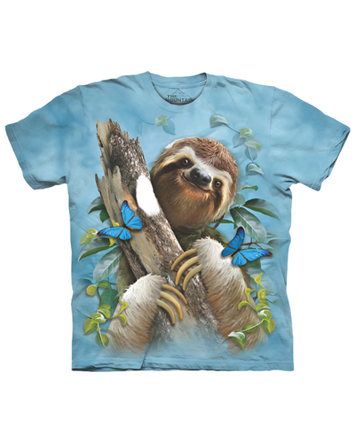 A light blue t-shirt featuring a realistic print of a sloth clinging to a tree branch, surrounded by green leaves and two vibrant blue butterflies.