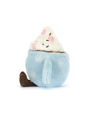 Side view of plush toy resembling a cup of hot chocolate with a marshmallow on a white background