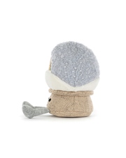 Side view of plush toy with a snow globe design on a white background