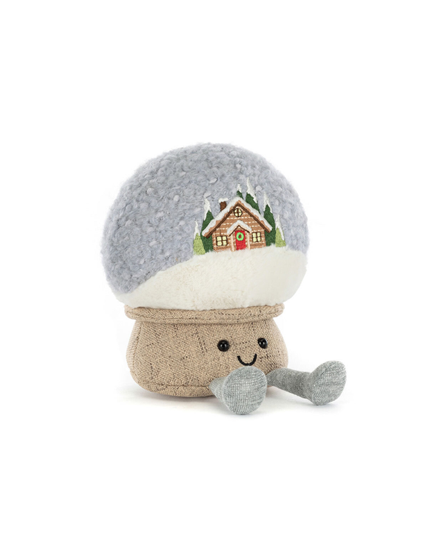 Plush toy with a snow globe design featuring a house on a white background