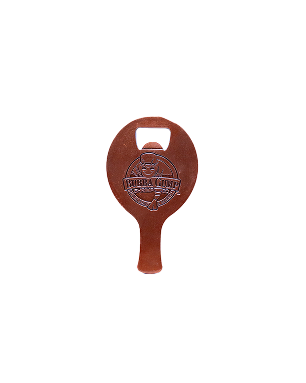 Brown Bubba Gump Shrimp Co. bottle opener with a circular design and a handle, featuring the restaurant's logo.