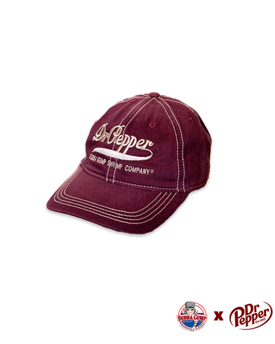 burgundy cap with dr pepper logo embroidered, beneath it in smaller font is "bubba gump shrimp company".