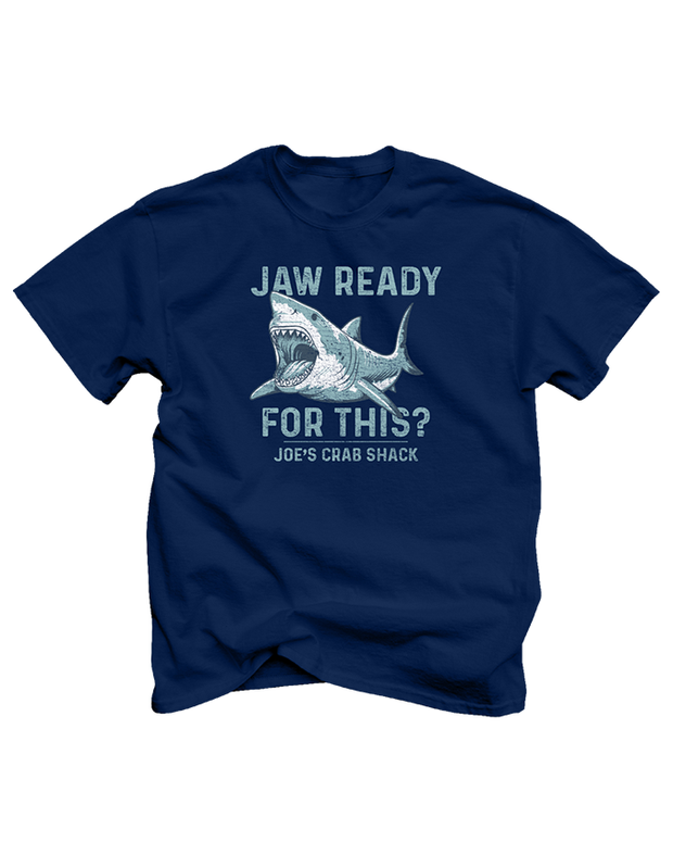 The shirt has a cartoon shark leaping out of the water with the punny phrase “JAW READY FOR THIS?” in bold, capitalized letters above the shark. Below the shark, it says “JOE’S CRAB SHACK” in a smaller font.