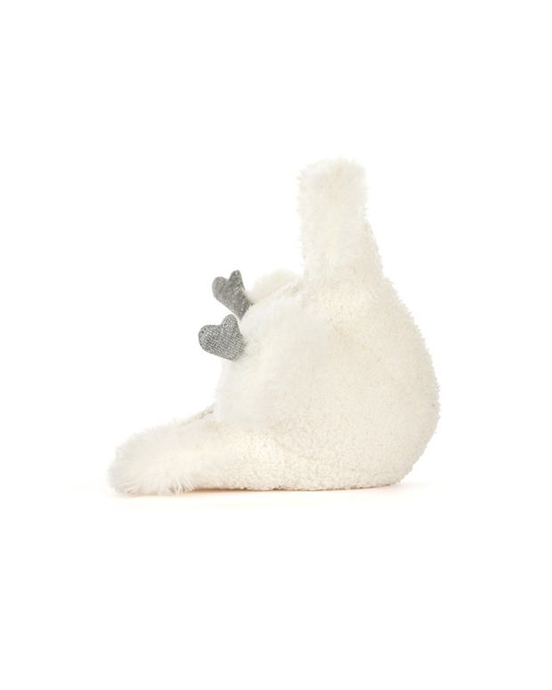 side view of snowflake with hands on a white background