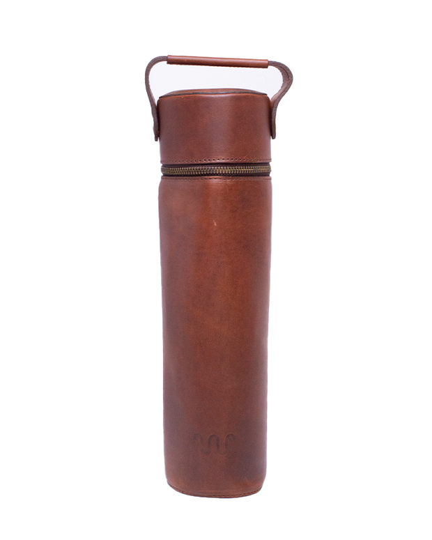 A cylindrical leather bottle holder with a zipper running horizontally on the top part. The holder appears to be designed for carrying and protecting a bottle, featuring a sturdy leather handle at the top for easy transport. The leather is a rich brown color and shows natural texture variation, suggesting quality material. There is an embossed King Ranch logo near the bottom.