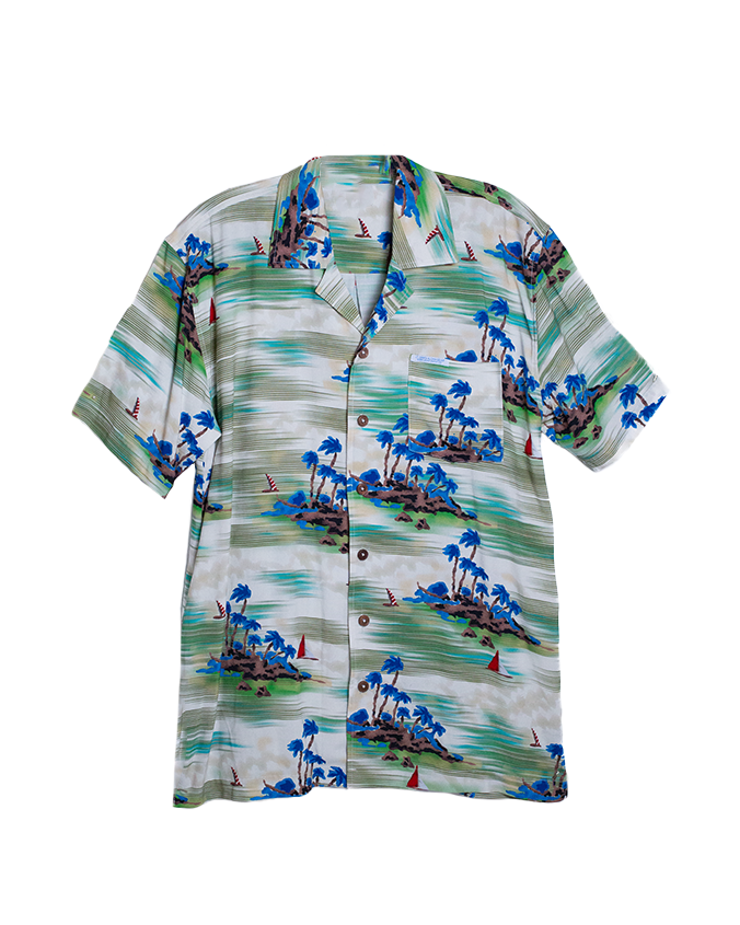 A colorful short-sleeve Hawaiian shirt featuring tropical palm trees, sailboats, and an island scene on a light background.