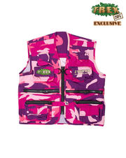 Pink camouflage print vest with zipper pockets and T-Rex Cafe logo with "Junior Paleontologist" embroidered in tan.