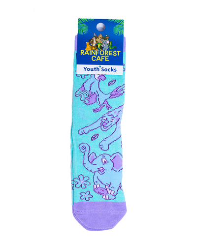 A pair of youth socks from Rainforest Cafe, featuring a playful design with purple outlines of animals such as an elephant and a jaguar on a light blue background. The attached tag displays the Rainforest Cafe logo with lush greenery, and indicates the product as ‘Youth Socks’.