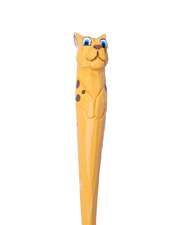 A close-up view of a whimsical yellow pen designed to resemble a cheetah, complete with blue eyes and playful brown spots.