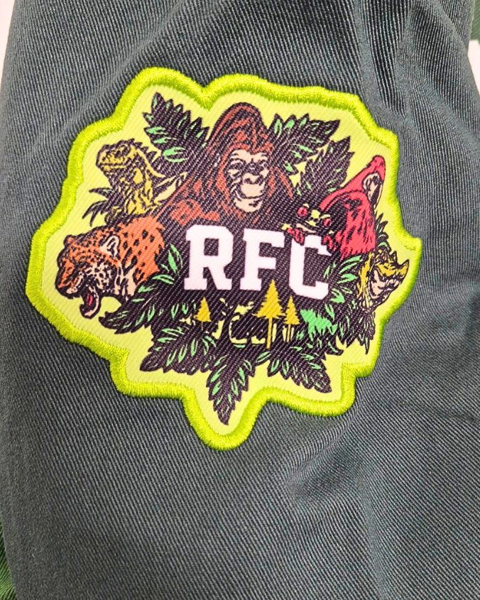 Colorful patch with 'RFC' logo on a gray background