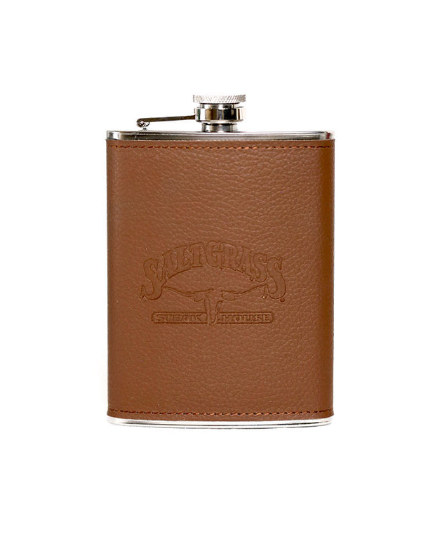 Milk chocolate brown leather wrapped hip flask with the Saltgrass logo outlined into the leather.