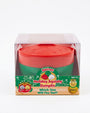 A packaged toy product labeled 'Holiday Squishy Dumplin' in a clear plastic box with a green and red squishy container visible inside. The front label includes festive holiday graphics and text such as 'Secret Edition' and 'Ages 6+'.