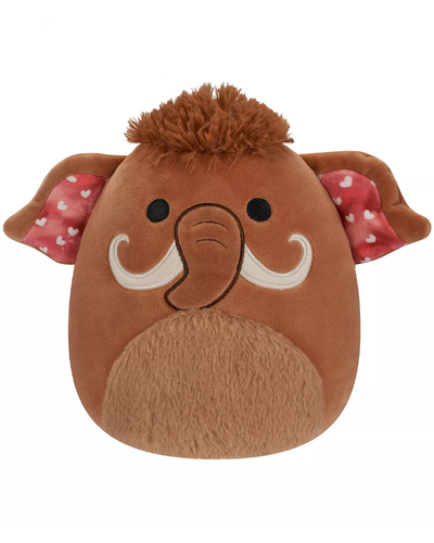 A plush toy resembling a cartoonish mammoth with large, round eyes, white tusks, and brown fur, featuring fabric ears with pink and white hearts.