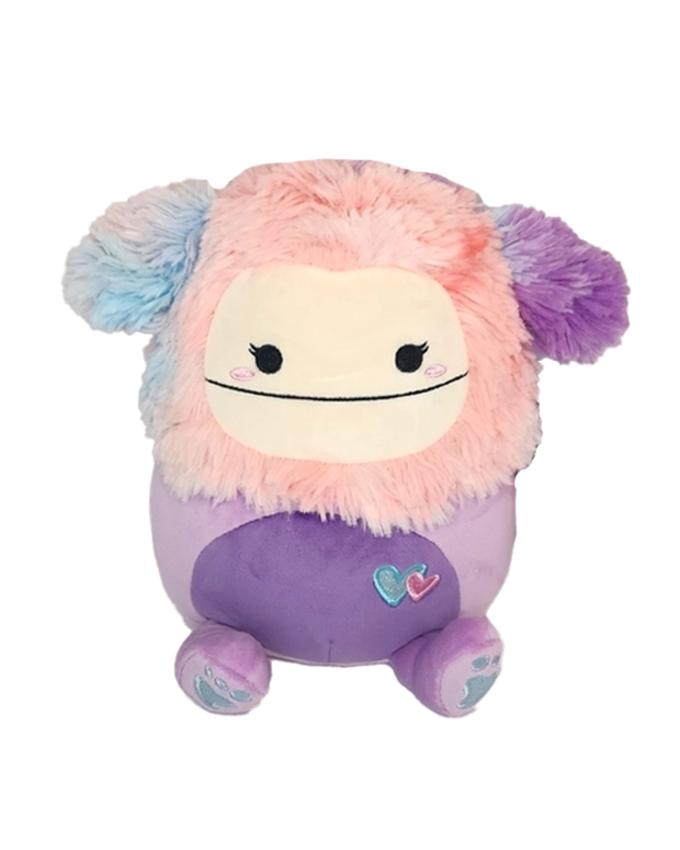 A colorful plush toy with a smiling face, featuring fluffy pink, blue, and purple fur, sits against a white background.