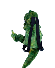 green shaped t-rex backpack with black straps. Back has a zipper.