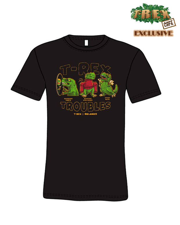 BLACK TEE, reading in a yellow outline "T-rex Troubles". Image of a green  t-rex brushing his teeth, wearing a long red sweater, and trying to scratch his back. 