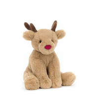 Plush reindeer toy on a white background