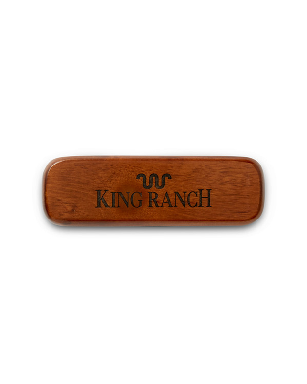 Wooden case closed to show King Ranch logo and symbol.