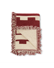 Folded throw blanket showing the front color brown and back color  off white.