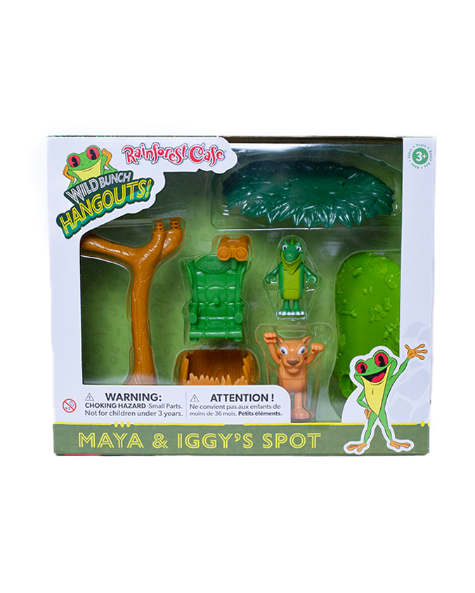 A children's toy set called "Maya & Iggy's Spot" from Rainforest Cafe, featuring a tree, chairs, and animal figures in a colorful box.