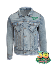 denim jackets front view with embroidered top, left chest wording that reads "rainforest cafe" in green. Bottom right corner tag "30 wild years. rainforst cafe" with cha cha in center of the zero.