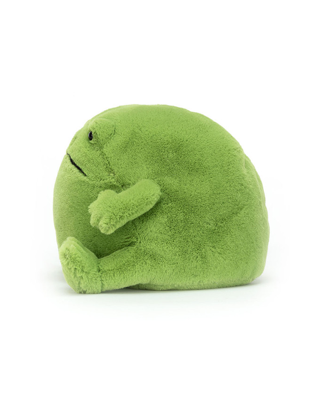 Side view of a round, green plush toy resembling a cartoon frog, sitting comfortably with small limbs and a peaceful expression on its face in front of a white background.
