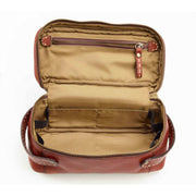 Inside of bag with zipper pocket on lid and tan interior.