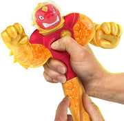 Red figurine being squeezed and stretched.