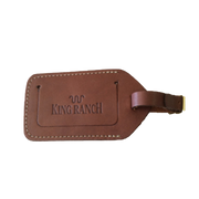 Brown leather luggage tag with King Ranch branding.