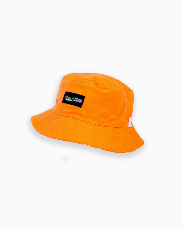 Bright orange bucket hat with black Draft Kings/Golden Nugget label stitched onto the front.