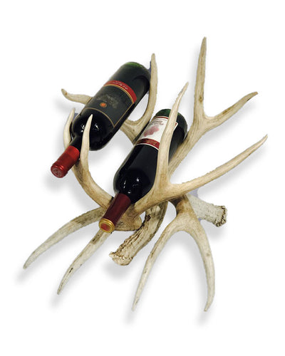 King Ranch Brand Antler, double bottle wine holder, pictured with two bottles of red wine.