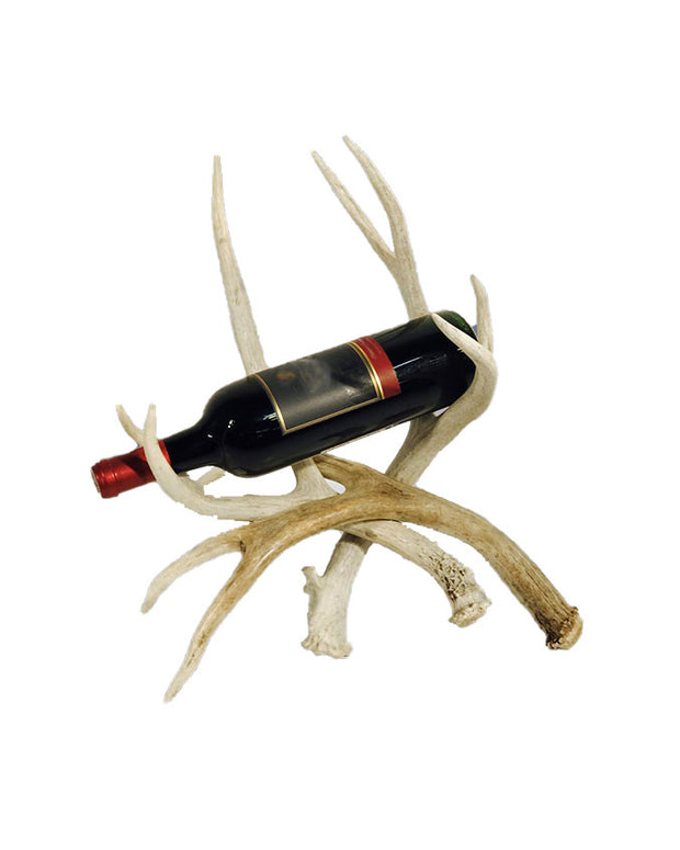 King Ranch Brand Antler, single bottle wine holder, pictured with bottle of red wine.