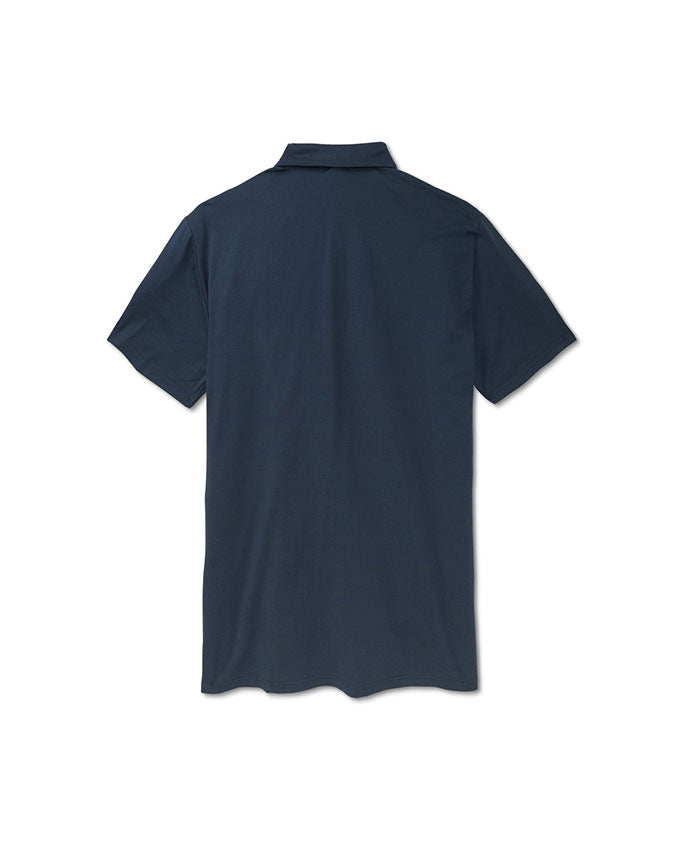Back of navy blue polo in front of all white background.