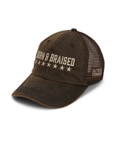 Dark brown cap with mesh back and "Born and Braised" underlined in stars embroidery.