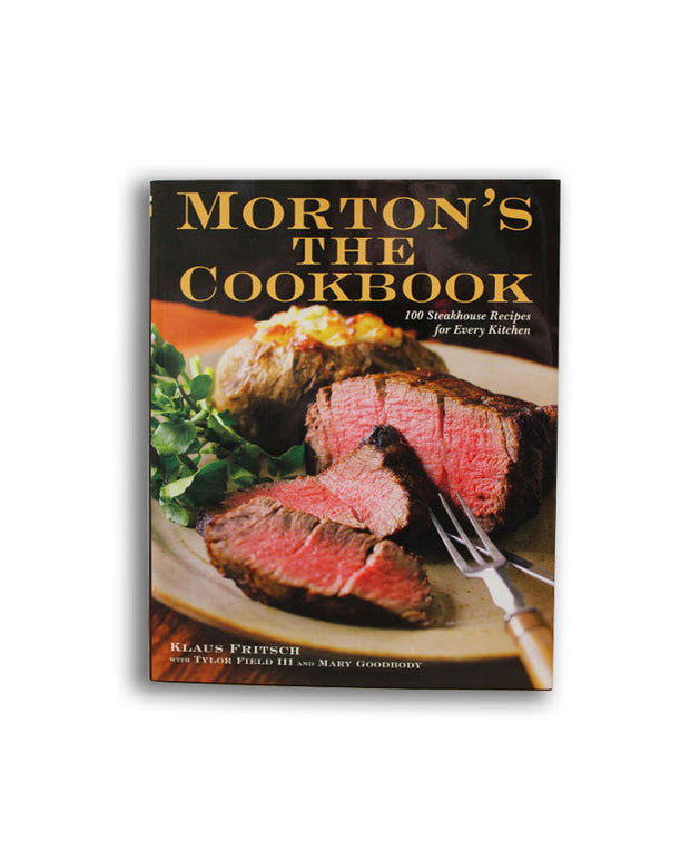 Front cover of Morton's The Cookbook with picture of cut steak and loaded baked potato.