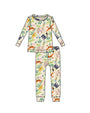 Graphic fashion design of cream-colored cotton PJ set with cartoon Rainforest Cafe characters patterned fabric and soft ribbed cuffs.