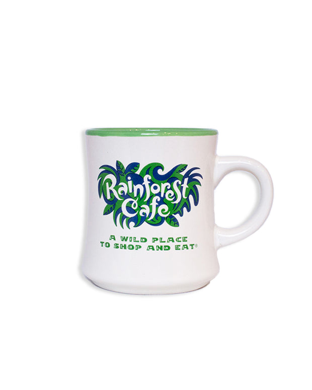 White ceramic coffee mug with the Rainforest Cafe logo in the middle in blue and green and "A Wild Place to Shop and Eat" underneath.