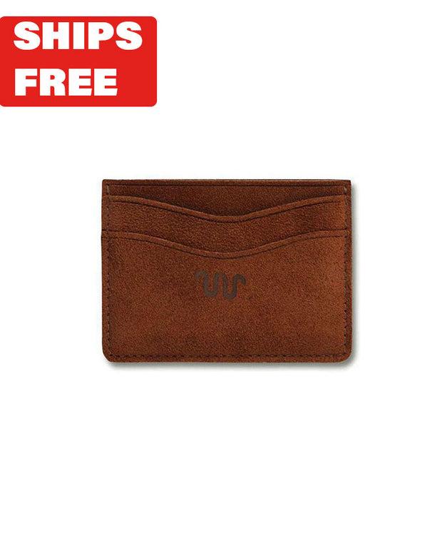 Ginger-colored leather card case with King Ranch logo towards the bottom and red "Ships Free" tag in corner.