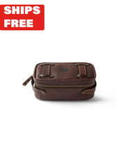 Dark brown leather dopp kit with buckle accents and King Ranch logo on top and red "Ships Free" tag in top corner.
